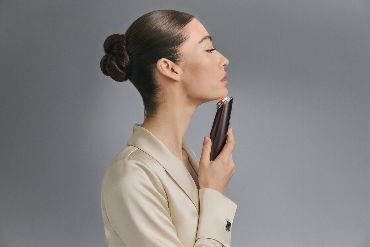 Model in profile using Photo Plus Deep Lift under her chin