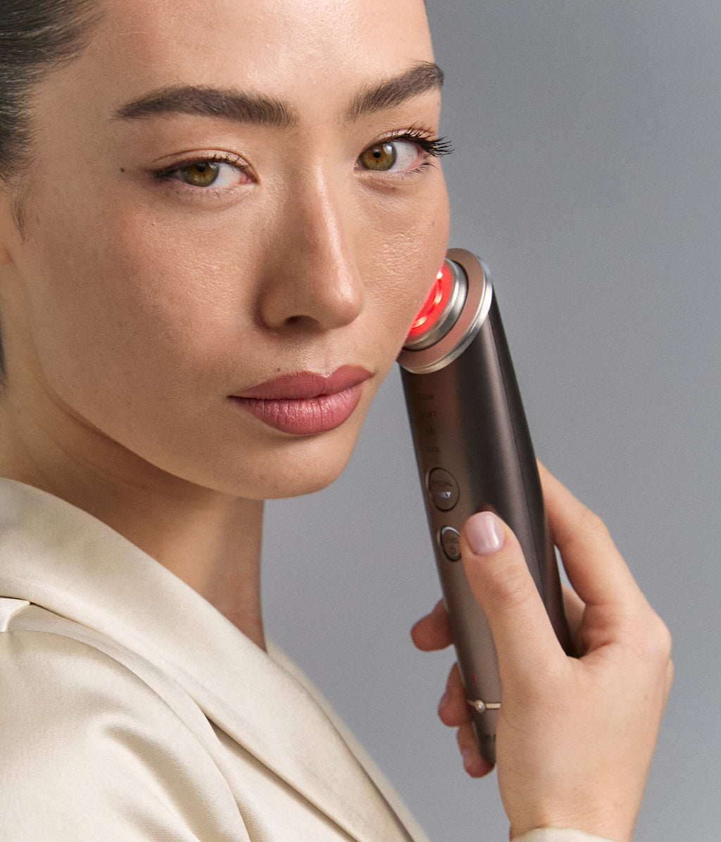 Close-up of Photo Plus Deep Lift head with red light on the cheek